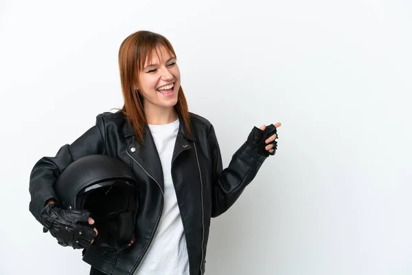 Redhead Girl Motorcycle Helmet Isolated White Background Pointing Finger Side — Stockfoto