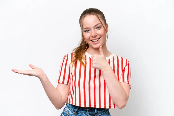 Young Caucasian Girl Isolated White Background Holding Copyspace Imaginary Palm — Stok fotoğraf