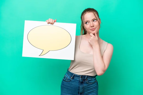 Young Caucasian Woman Isolated Green Background Holding Placard Speech Bubble — Stock Photo, Image