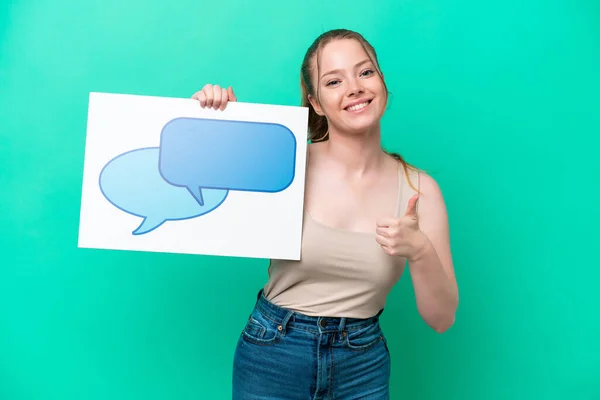 Young Caucasian Woman Isolated Green Background Holding Placard Speech Bubble — Stok Foto