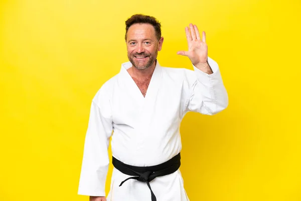 Middle Age Caucasian Man Doing Karate Isolated Yellow Background Counting — Foto de Stock