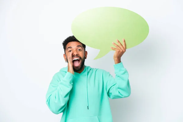 Jovem Brasileiro Isolado Fundo Branco Segurando Uma Bolha Fala Vazia — Fotografia de Stock