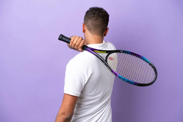 Young Brazilian Man Isolated Purple Background Playing Tennis — Fotografia de Stock