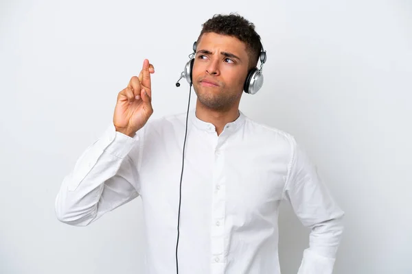 Telemarketer Brazilian Man Working Headset Isolated White Background Fingers Crossing — Stock Photo, Image
