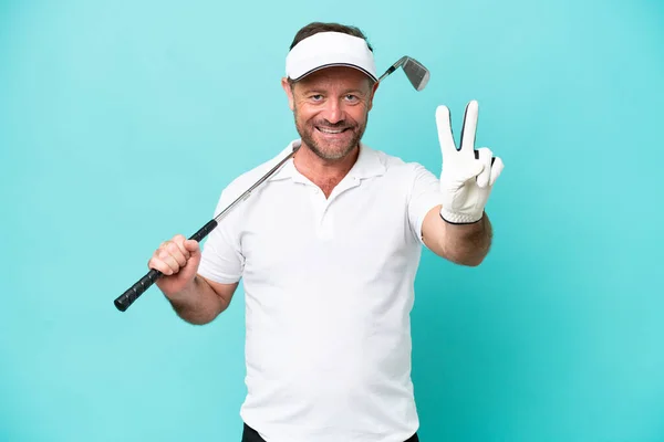 Homem Jogador Golfe Caucasiano Meia Idade Isolado Fundo Azul Sorrindo — Fotografia de Stock