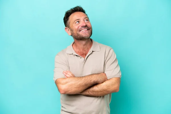 Middle Age Caucasian Man Isolated Blue Background Looking While Smiling — Foto Stock