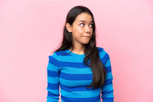 Young Colombian Woman Isolated Pink Background Having Doubts While Looking — 图库照片