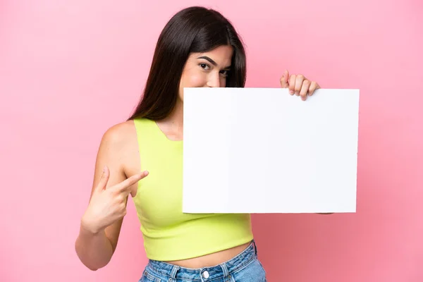 Young Brazilian Woman Isolated Pink Background Holding Empty Placard Hiding — Stock fotografie