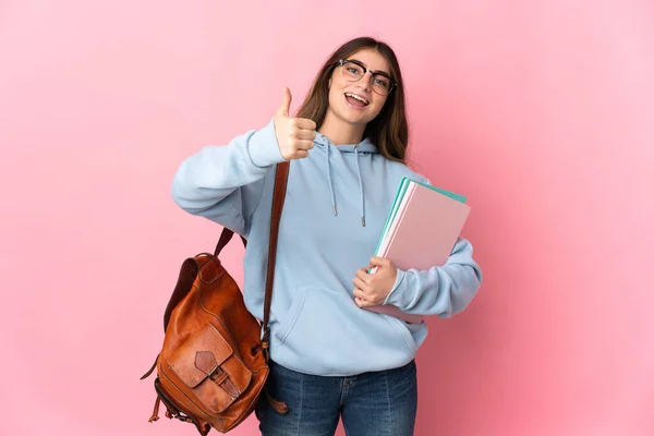 Νεαρή Φοιτήτρια Απομονωμένη Ροζ Φόντο Σηκωμένους Τους Αντίχειρες Γιατί Κάτι — Φωτογραφία Αρχείου