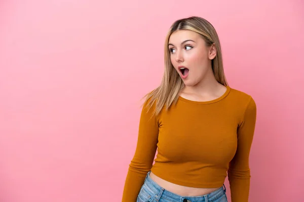 Young Caucasian Woman Isolated Pink Background Doing Surprise Gesture While — Stock Photo, Image
