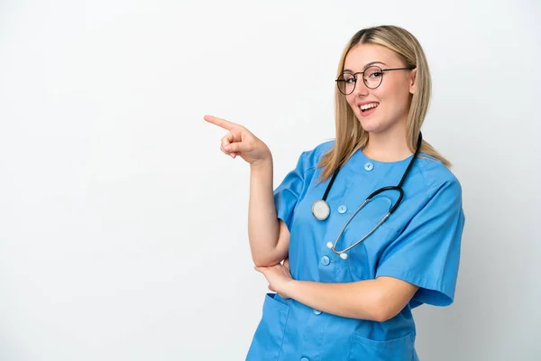 Young Surgeon Doctor Woman Isolated White Background Pointing Finger Side — Stock Photo, Image