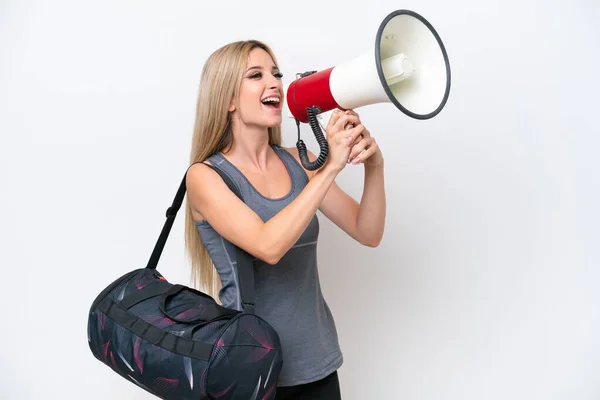 Young Sport Woman Sport Bag Isolated White Background Shouting Megaphone — Stock Photo, Image