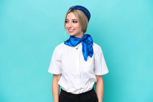Airplane Blonde Stewardess Woman Isolated Blue Background Looking Side — Stock Photo, Image