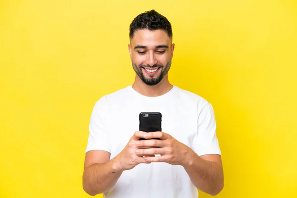 Young Arab Handsome Man Isolated Yellow Background Sending Message Email —  Fotos de Stock