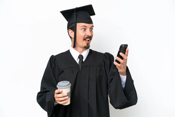 Young University Graduate Man Isolated White Background Holding Coffee Take — Φωτογραφία Αρχείου