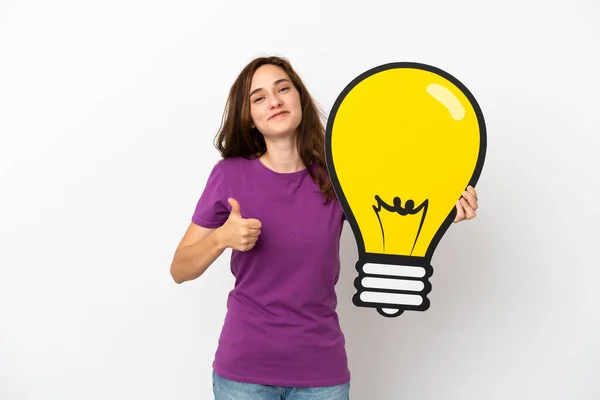 Young Caucasian Woman Isolated White Background Holding Bulb Icon Thumb — Stock Photo, Image