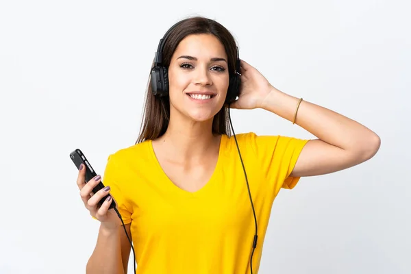 Jeune Femme Caucasienne Isolée Sur Fond Blanc Écouter Musique — Photo