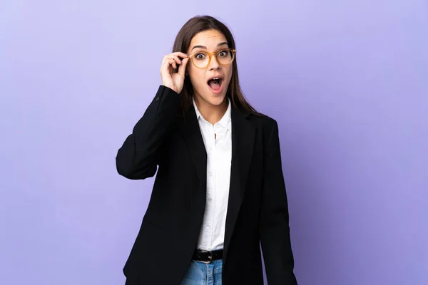 Business Woman Isolated Purple Background Glasses Surprised — Zdjęcie stockowe