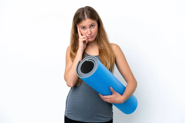 Young Sport Woman Going Yoga Classes While Holding Mat Thinking — 图库照片