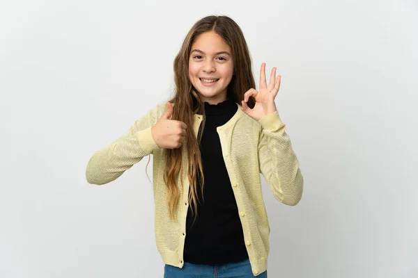 Маленька Дівчинка Над Ізольованим Білим Тлом Показує Знак Великий Палець — стокове фото