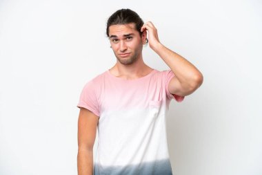 Caucasian handsome man isolated on white background having doubts