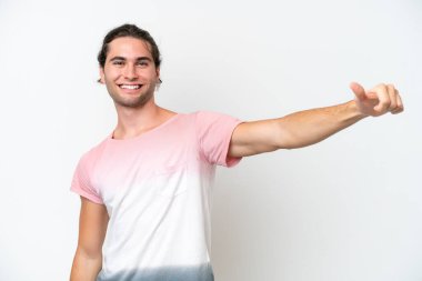 Caucasian handsome man isolated on white background giving a thumbs up gesture