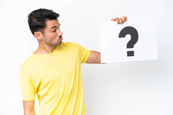 Jovem Homem Bonito Sobre Fundo Branco Isolado Segurando Cartaz Com — Fotografia de Stock