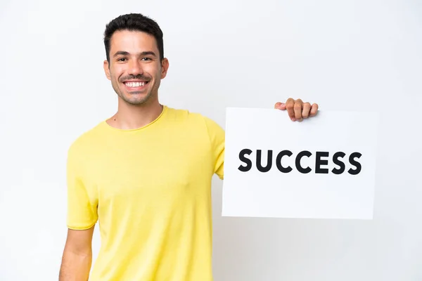 Junger Gutaussehender Mann Auf Isoliertem Weißem Hintergrund Mit Einem Plakat — Stockfoto