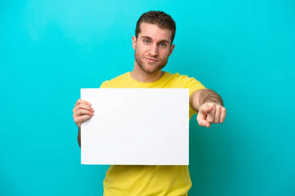 Young Caucasian Man Isolated Blue Background Holding Empty Placard Pointing — Stock Photo, Image
