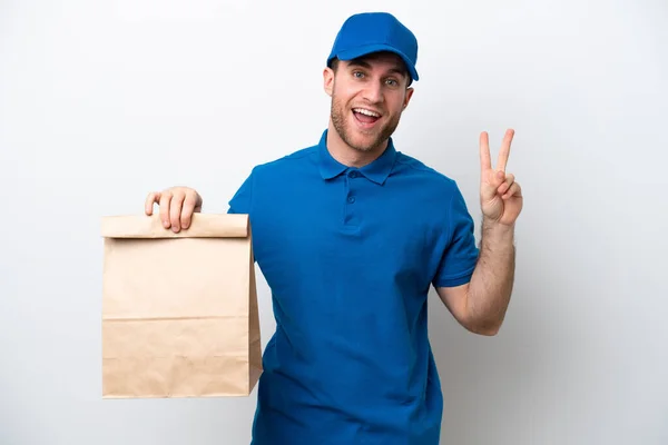 Levering Kaukasische Man Geïsoleerd Witte Achtergrond Glimlachen Tonen Overwinning Teken — Stockfoto