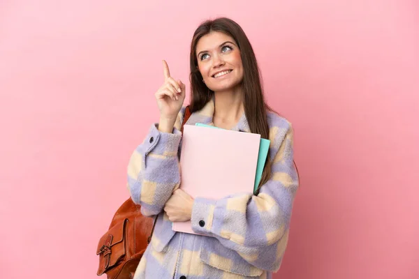 Jonge Student Vrouw Geïsoleerd Roze Achtergrond Wijzend Een Geweldig Idee — Stockfoto