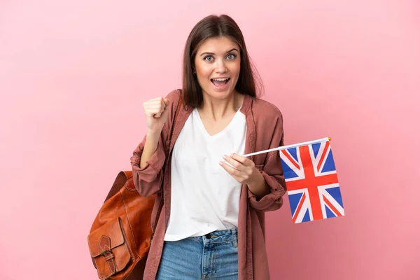 Young Caucasian Woman Holding United Kingdom Flag Isolated Pink Background — Stockfoto