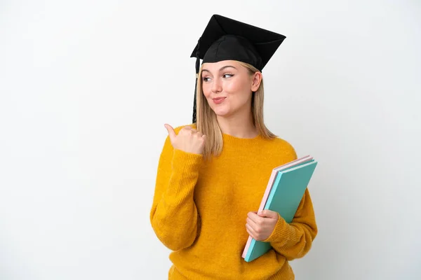 Joven Estudiante Caucásica Aislada Sobre Fondo Blanco Apuntando Hacia Lado — Foto de Stock