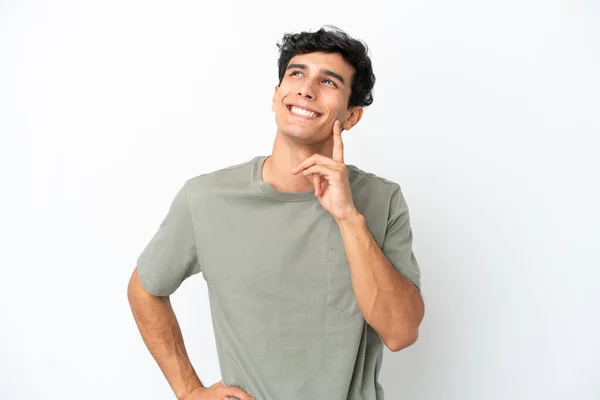 Young Argentinian Man Isolated White Background Thinking Idea While Looking — Stock Fotó