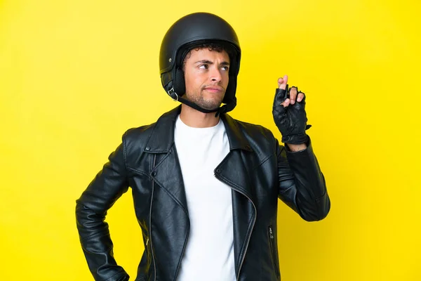 Young Brazilian Man Motorcycle Helmet Isolated Yellow Background Fingers Crossing — Φωτογραφία Αρχείου
