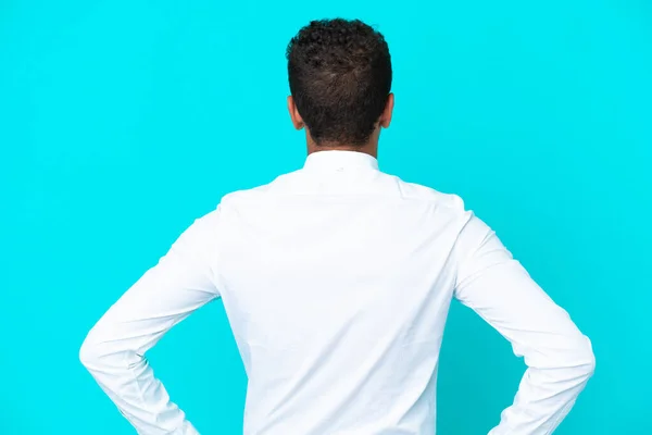 Young Business Brazilian Man Isolated Blue Background Back Position — Stock Photo, Image