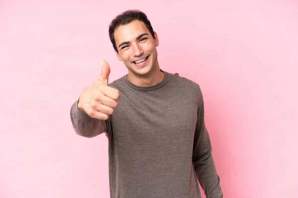 Young Caucasian Man Isolated Pink Background Thumbs Because Something Good — Zdjęcie stockowe