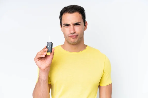 Young Caucasian Man Holding Car Keys Isolated White Background Sad — Stock fotografie