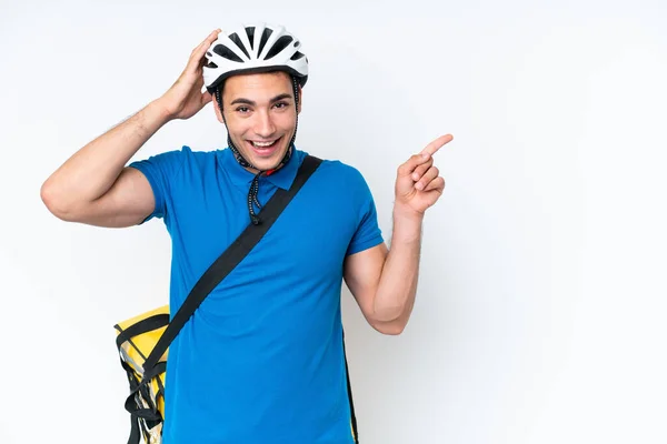 Young Caucasian Man Thermal Backpack Isolated White Background Surprised Pointing — ストック写真