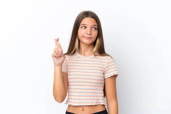 Pequena Menina Caucasiana Isolado Fundo Branco Com Dedos Cruzando Desejando — Fotografia de Stock