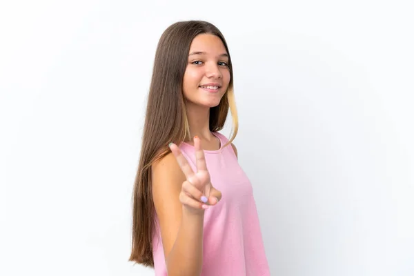 Menina Caucasiana Pouco Isolado Fundo Branco Sorrindo Mostrando Sinal Vitória — Fotografia de Stock