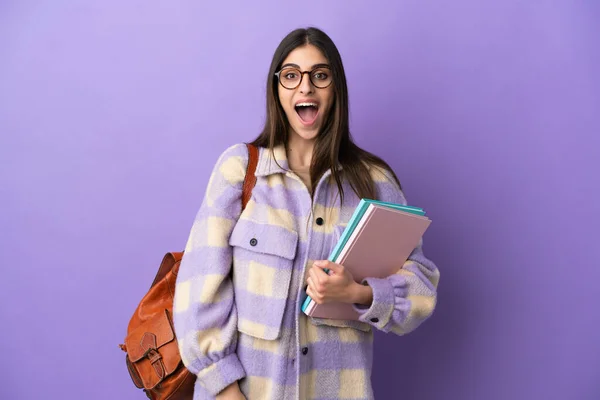 Giovane Studentessa Isolata Sfondo Viola Con Espressione Facciale Sorpresa — Foto Stock