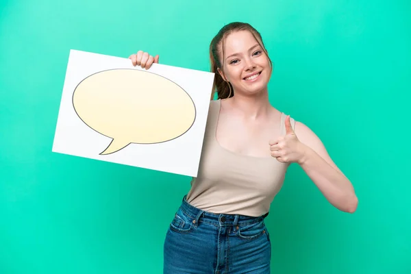 Young Caucasian Woman Isolated Green Background Holding Placard Speech Bubble — Fotografia de Stock