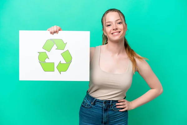 Young Caucasian Woman Isolated Green Background Holding Placard Recycle Icon — Photo