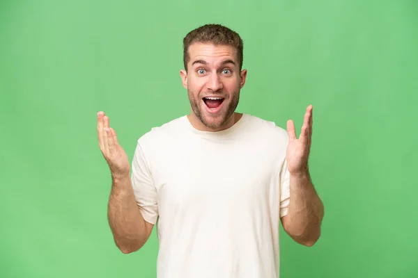 Young Handsome Caucasian Man Isolated Green Chroma Background Surprise Facial — Stock Photo, Image
