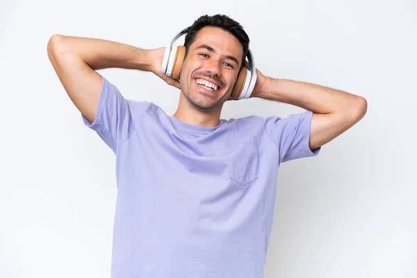 Jonge Knappe Man Geïsoleerde Witte Achtergrond Luisteren Muziek — Stockfoto