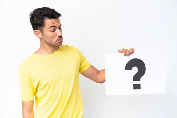 Jovem Homem Bonito Sobre Fundo Branco Isolado Segurando Cartaz Com — Fotografia de Stock