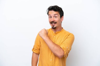 Young man with moustache isolated on white background celebrating a victory
