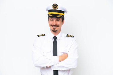 Airplane caucasian pilot isolated on white background keeping the arms crossed in frontal position