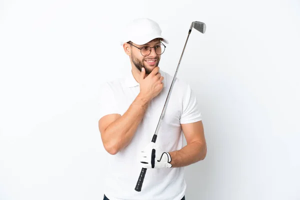 Guapo Joven Jugando Golf Aislado Sobre Fondo Blanco Mirando Lado —  Fotos de Stock